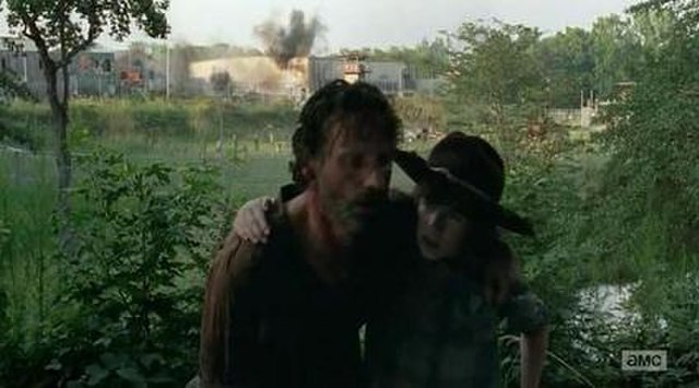 A beaten down Rick and his son Carl escape the destroyed prison in the aftermath of the assault that takes the lives of many people.