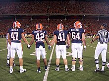 Leman (47) and Illinois' other captains take the field. Leman cap.jpg