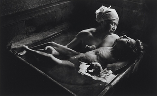 <i>Tomoko and Mother in the Bath</i> 1971 photograph by W. Eugene Smith