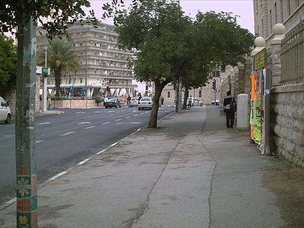 Sirens blare at 10:00 a.m. as motorists exit their cars and stand in silence in front of the Prime Minister's House in Jerusalem and throughout Israel