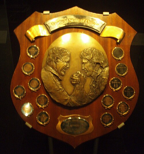 The first State of Origin shield, depicting Queensland's Wally Lewis and New South Wales' Brett Kenny.