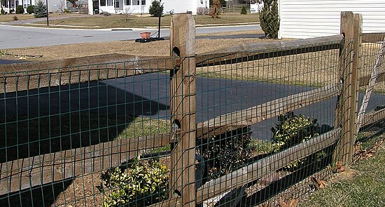 A mortised split-rail fence in suburban America, built in 1999