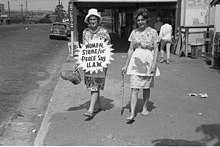 Women protesting with UAW banner and apron during Aldermaston peace march in Brisbane, 1964 1964-04-05 UAW protest in Brisbane.jpg