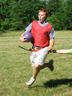 An ECyD member playing a variation of capture the flag at Camp River Ridge in Indiana. River Ridge 2007.jpg
