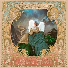 An elaborate art nouveau cover with Ferrell in the form of a sphinx reclining on a rock, surrounded by illustrations of cherubs, wood sprites, candles, spiders, and flowers