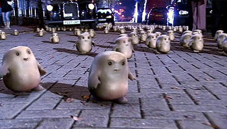 The Adipose, CGI aliens depicted using MASSIVE, waddle through Central London towards Adipose Industries.