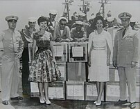 The Navy joins in to help Sara and Yvonne bring supplies to their orphanages in Japan. SaraYvonneandTroops.JPG