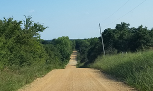 View of Roasting Ear Ridge (left side of the road) from south of the intersection of EW 1390 and NS 3630, facing South. North of Sasakwa, Seminole County, Oklahoma, August 4, 2017 RoastingEarRidge.png