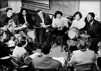 Social science class with Professor John Graves, at globe, who became executive director of the institute's Franklin Hall Annex in February 1950.