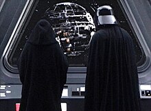 Emperor Palpatine (left) and Darth Vader (right) oversee the construction of the first Death Star in Star Wars: Episode III - Revenge of the Sith. Vaderrots.jpeg