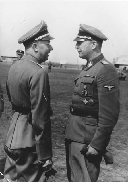 SS-Obergruppenführer Hans-Adolf Prützmann (right) meets with Reichsführer-SS Heinrich Himmler, during Himmler's visit to Ukraine, September 1942.