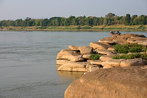 Don Kho as seen from exposed rocks in the Mekong Don kho island.jpg