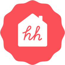 A red, radial geometric shape with a 2D white house in the centre bearing two red lowercase letters "hh"