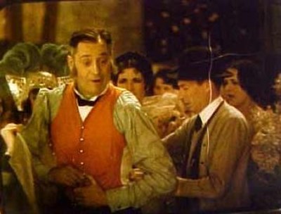 Sam Hardy in orange vest. A frame from a surviving 20-second color fragment found in 2005.