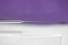 Borosilicate glass micropipette pulled with a Flaming/Brown micropipette puller P-97 Pulled pipette.jpg