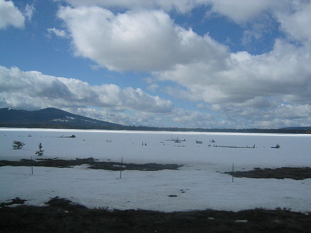 Hog Flat Reservoir covered in snow during early April