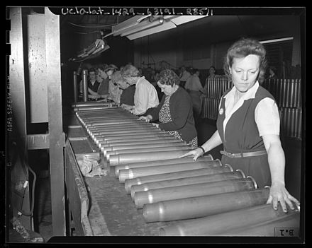 Ordnance workers inspecting cartridge cases in Los Angeles, 1943