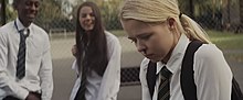 In the music video, a schoolgirl is bullied by her peers.