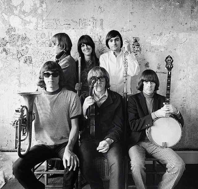 Jefferson Airplane photographed by Herb Greene in his dining room, San Francisco, late 1966; top row from left: Jack Casady, Grace Slick, Marty Balin;