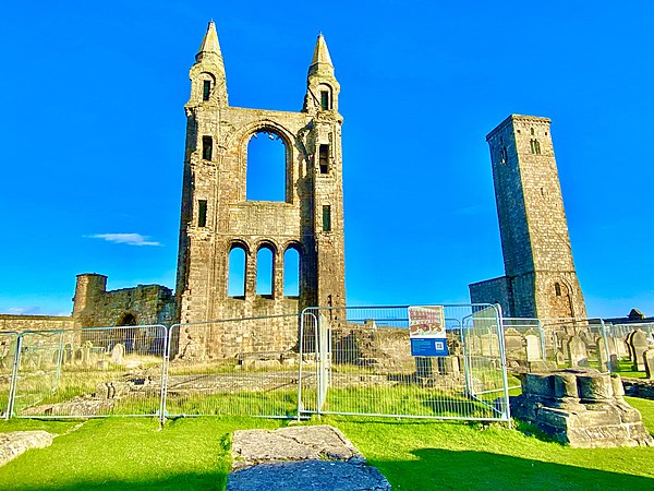 Recent view of the St Rule's Tower, remains of Eastern wall of later Cathedral, and the graveyard beneath, 10 October 2022.