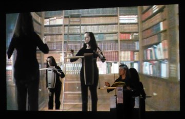 Elizabeth Brown, A Bookmobile for Dreamers, video and opera performance for theremin and recorded sound in collaboration with Lothar Osterburg, 2011, performance still. Elizabeth Brown A Bookmobile for Dreamers 2011.jpg