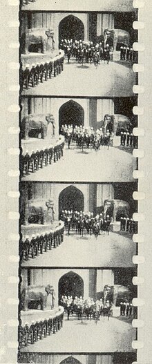 Frames from lost sequence of With Our King and Queen Through India showing the state entry into Delhi. Kinemacolor films appear black-and-white - the colour effect occurs in projection Kinemacolor filmstrip for With Our King and Queen Through India (1912).jpg