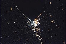 Sarnia from space, this time at night - Taken by Chris Hadfield, the only astronaut from Sarnia who wanted to snap a photo of his hometown from the International Space Station. Before the flyover, Hadfield arranged with the citizens of Sarnia via Twitter and Facebook to turn on all their lights both inside and outside their homes. Sarnia at Night from Space.jpg