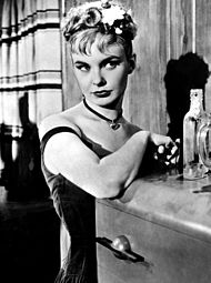Woodward in The Three Faces of Eve (1957), displaying "Eve Black", the "bad girl" personality Joanne Woodward - 1957.jpg
