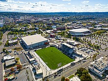The North Bank area of downtown south of Boone Ave. One Spokane Stadium (aerial photo looking southwest).jpg