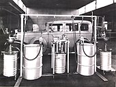 An early lubrication island at a service station in the 1930s. First-Auto-Systems.jpg