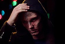 Alex Pettyfer in prosthetics as the beast. The makeup includes 67 pieces; seven on his head and 60 tattoos and individual scars in his whole body. It took seven hours to apply the full-body makeup. BEAST alex.jpg