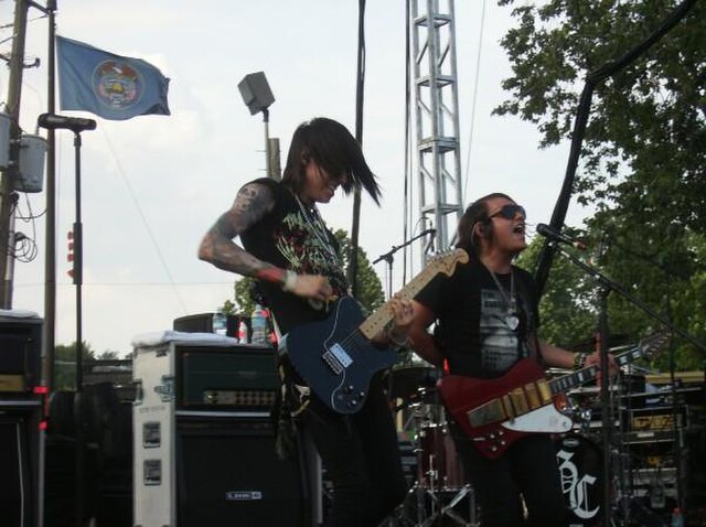 Metro Station performing in 2008; Trace Cyrus (left) and Mason Musso (right)