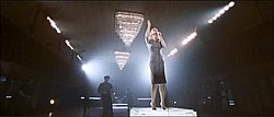 The main version of "Mercy" shows Duffy standing on top of a platform inside a large hall whilst men dance around her. Duffy Mercy.jpg