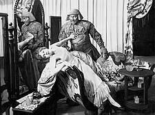Paul Wegener (Golem) and Lyda Salmonova (Jessica), in the 1915 German, partially lost film, horror film Der Golem 1915.jpeg