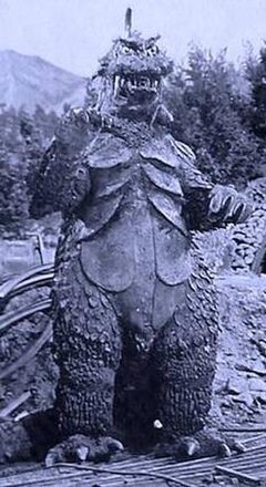 The monster Gomess from episode 1. The monster was brought to life with a modified Godzilla suits from the films Mothra vs. Godzilla and Ghidorah, the