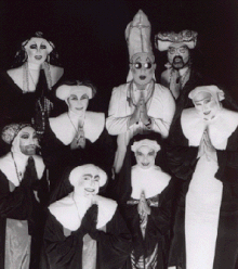 The Sisters of Perpetual Indulgence, promoting the 1995 HallowQueen charity event, a part of helping move Halloween in the Castro out of the neighborhood by staging a costume-mandatory party in the SoMa district instead. Photo Shoot For Halloween 1995 Poster Photo by Brian Ashby.gif