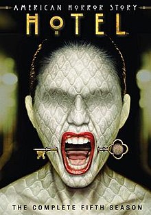 DVD cover art for AHS Hotel, showing a woman screaming with a key stuck from her cheeks.