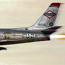 A painting of the rear end of a jet with graffiti about Eminem on it