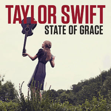 A photograph of Swift standing in a grassland, with her back facing the camera. She is wearing a purple dress and holding a guitar upside-down. Her name "Taylor Swift" is printed in red and the title "State of Grace" is printed in white; both are capitalized.