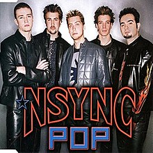 NSYNC posing in front of a gray background. The group's name and song title are positioned in front of them