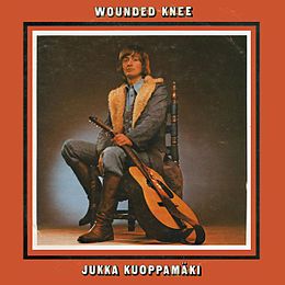 Studioalbumin Wounded Knee kansikuva