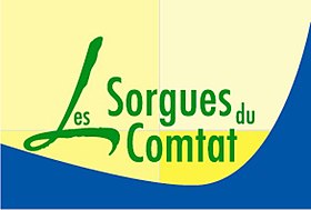Les Sorgues du Comtat községek közösségének címere