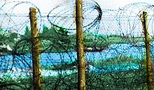 גדרות מחנה אם שטאו על רקע נהר טרווה Trave