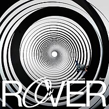 A spiral of concentric black and white circles with Kai walking on top of them, with the title superimposed