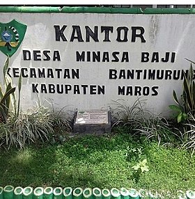 Papan nama di depan Kantor Desa Minasa Baji