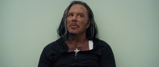 Ivan Vanko, alias Whiplash interpretato da Mickey Rourke nel film Iron Man 2.