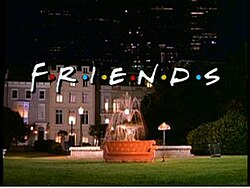 The title screen, featuring a sofa in front of a fountain in a park