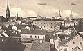 Skats uz Dīķa ielas namu jumtiem un Jelgavas baznīcu torņiem (no nama Palejas un Vaļņu ielas krustojumā, 1916)