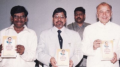 Arun Kamble with Petroleum minister SushilKumar Shinde.JPG
