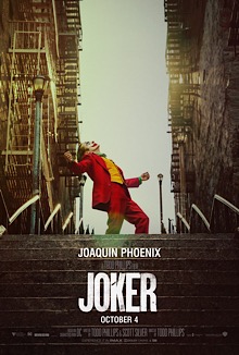 The Joker dances on a set of stairs. Below him are the words "Joaquin Phoenix", "A Todd Phillips film", "Joker", "October 4".
